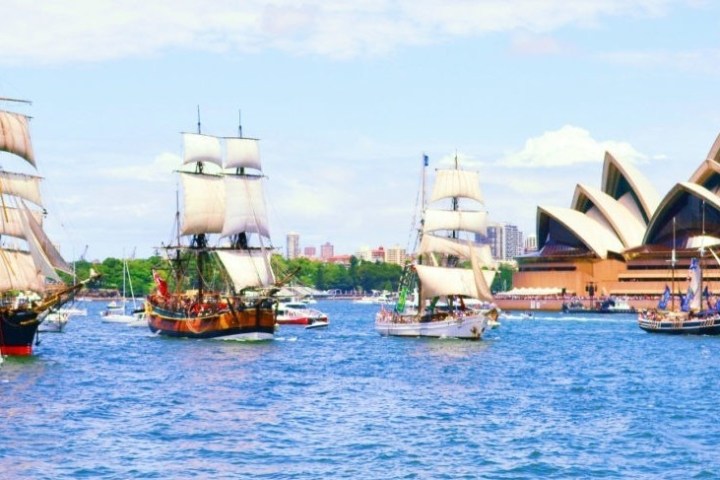 a boat is docked next to a body of water